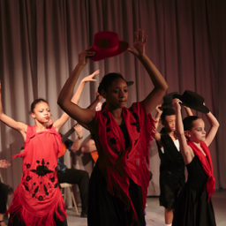 4 girls and one boy using sombrero cordobes at 2015 Recital. Photo: Eric Bandiero.