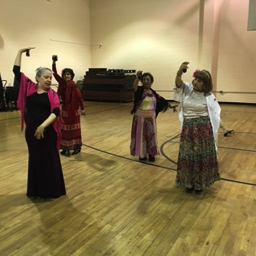 Aurora Reyes instructs 3 seniors in castanets at xxx in Corona 2019